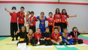 Students posing with their medals